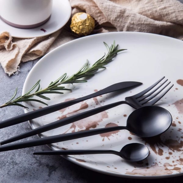 black fork, knife, spoon, plate