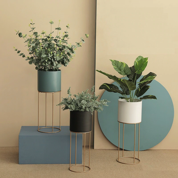 Large modern plant pots with gold stand